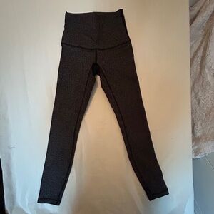 Lululemon wunder under leggings size 2 black and gray herringbone knit.